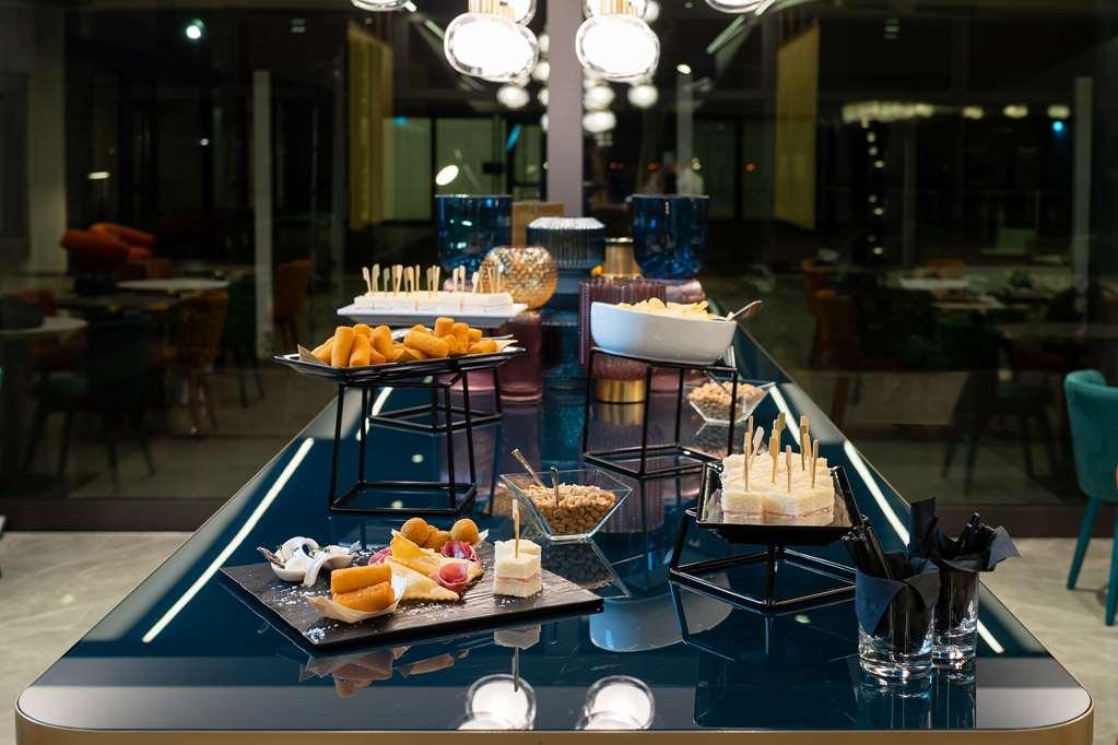 Doubletree By Hilton Milan Malpensa Solbiate Olona Hotel Restoran gambar